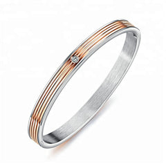 Stainless Steel and Rose Gold Plated Ladies Bangle with Crystal in Center 160mm
